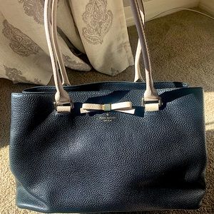 Kate Spade black leather bag with small pink bow